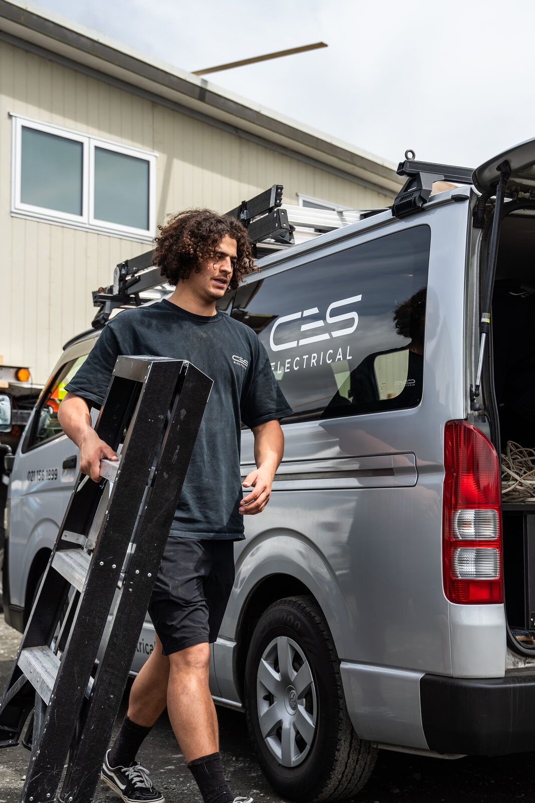 CES Electrical technician with branded van on a residential job
